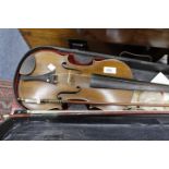 AN ANTIQUE VIOLIN with a single piece back, a further antique violin, three violin bows and two