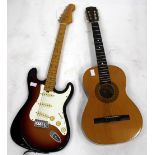 AN ENCORE SPANISH STYLED GUITAR 91cm in length and an electric guitar (2)