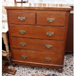 A 19TH CENTURY SATIN WALNUT TWO SHORT OVER THREE LONG DRAWER CHEST OF DRAWERS standing on bun