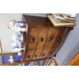 A VICTORIAN MAHOGANY BOW FRONTED CHEST OF TWO SHORT AND THREE LONG DRAWERS with turned knob