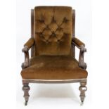 A VICTORIAN MAHOGANY AND BROWN VELOUR BUTTON BACK ARMCHAIR, 96cm high