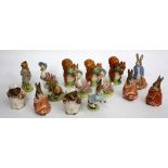 A COLLECTION OF BEATRIX POTTER FIGURINES both Royal Albert and Beswick, including Squirrel Nutkin,