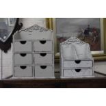 A GREY SHABBY CHIC DESK STAND and a letter rack fitted with two drawers (2)