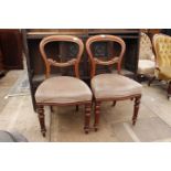 A SET OF SIX MID VICTORIAN MAHOGANY BALLOON BACK DINING CHAIRS (6)