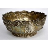 AN AMERICAN WHITE METAL BOWL with scrolling rim stamped sterling and 925/1000 fine to the