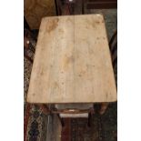 A VICTORIAN PINE TOPPED KITCHEN TABLE, standing on turned tapering legs, 122cm x 75cm x 34cm