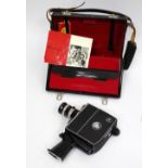 A BOLEX PAILLARD K2 ZOOM REFLEX AUTOMATIC CINE CAMERA with its original fitted case and