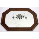 AN OAK FRAMED WALL MIRROR with cut decoration and painted floral sprays, 74cm x 69cm