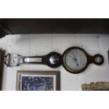 AN ANTIQUE MAHOGANY CASED DIAL BAROMETER with hydrometer, thermometer, convex mirror, silvered