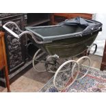 AN ANTIQUE PRAM, 145cm in length