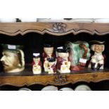 A GROUP OF CHARACTER JUGS to include a graduated set of four Tony Wood character jugs (7)
