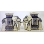 TWO EASTERN POTTERY PLANT STANDS in the form of elephants, each 48cm x 42cm (2)