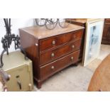 AN ANTIQUE MAHOGANY CHEST of three long drawers standing on bracket feet 110cm wide