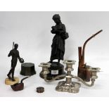 TWO SPELTER FIGURES a three branch candelabra and a copper pipe
