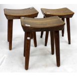 A GROUP OF THREE TEAK STOOLS designed by Ray Carter for Indcoope Brewery, each with a shaped seat