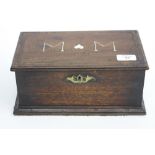 A MID TO LATE 18TH CENTURY MAHOGANY FITTED BOX with ivory M.M. initialled monogram to the top 27cm x