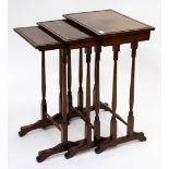 A NEST OF THREE REGENCY MAHOGANY RECTANGULAR TOPPED OCCASIONAL TABLES, the largest 46cm wide