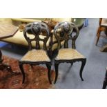 TWO LATE 19TH CENTURY BLACK LACQUERED PAPIER MACHE AND MOTHER OF PEARL INLAID CHAIRS