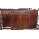 A LATE 18TH / EARLY 19TH CENTURY MAHOGANY BREAK FRONT SIDE BOARD with swan neck brass handles,