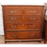 A LATE GEORGE III OAK MULE CHEST OR TWO SHORT OVER THREE LONG DRAWER CHEST, 112cm x 112cm x 52cm