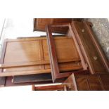 AN EDWARDIAN MAHOGANY AND CROSS BANDED PANELLED WARDROBE standing on plinth base