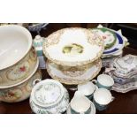 A PAIR OF VICTORIAN STAFFORDSHIRE PORCELAIN COMPORTS decorated with flowers within a gilt and basket