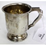 A BIRMINGHAM SILVER TROPHY HANDLED MUG 8cm high made by Blackmore and Fletcher Ltd., dated 1939