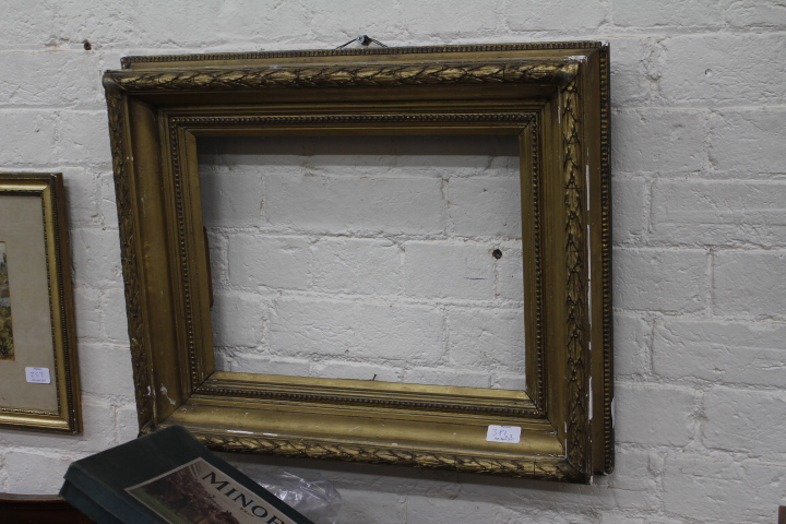 A PAIR OF GILDED RECTANGULAR PICTURE FRAMES with beaded and acanthus leaf mouldings, each aperture - Image 2 of 2