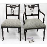 A SET OF SEVEN 19TH CENTURY REGENCY STYLE DINING CHAIRS with pierced backs and later upholstered