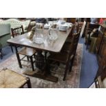 AN OAK DINING / REFECTORY TABLE with pleated ends, 226cm wide x 79cm high x 82cm deep