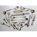 A GROUP OF AMERICAN CUTLERY mainly consisting of serving spoons, a cake slice etc., mostly if not