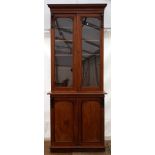 A VICTORIAN MAHOGANY GLAZED BOOKCASE CABINET, 96cm wide x 239cm high together with a similar