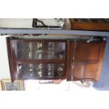 A VICTORIAN MAHOGANY BOOKCASE CABINET with twin astragal glazed doors above twin panel doors below