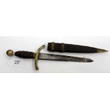 AN ANTIQUE DAGGER with leather grip and brass pommel, in scabbard 33cm overall