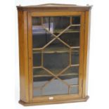 A 19TH CENTURY PINE CORNER CABINET with an astral glazed door, 76cm wide x 105cm high