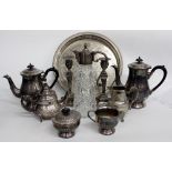 A SMALL QUANTITY OF SILVER PLATE to include a part coffee and tea set, a pair of Adams style