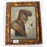 A SMALL CONTINENTAL SCHOOL OIL ON CANVAS LAID ON BOARD OF A BEARDED MAN with pipe, 24.5cm x 19cm