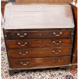 AN ANTIQUE OAK BUREAU, the fall front above four long drawers, standing on bracket feet, 91cm x 98cm