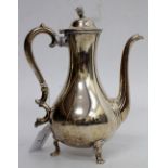 AN AMERICAN WHITE METAL COFFEE POT by Tiffany & Co., of baluster form with scrolling handle and