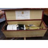 A BOTTLE OF DRY MONOPOLE CHAMPAGNE in a box