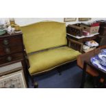 A LATE 19TH CENTURY WALNUT FRAMED HIGH BACKED SETTEE with a yellow Draylon upholstered back and