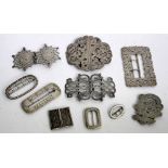 A COLLECTION OF ANTIQUE AND LATER SILVER AND WHITE METAL BELT BUCKLES