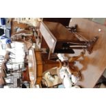 A VICTORIAN OCTAGONAL WALNUT WORK TABLE with decorative inlay to the top and tripod base 43cm wide