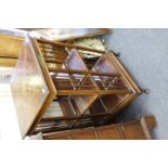 AN EDWARDIAN MAHOGANY MARQUETRY AND LINE INLAID REVOLVING BOOKCASE, with presentation plaque, 87cm