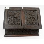 A LATE 19TH / EARLY 20TH CENTURY CARVED OAK STATIONARY BOX, 36cm wide