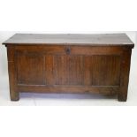 AN EARLY TO MID 18TH CENTURY OAK PANELLED COFFER, 124cm x 57cm x 50cm