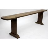 A LIGHT OAK COUNTRY STYLE BENCH, 48cm high x 180cm wide