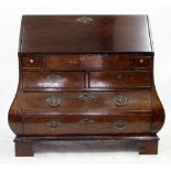 AN ANTIQUE DUTCH MAHOGANY BOMBAY BUREAU, the fall front enclosing a fitted interior over two small