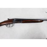 A BASQUE. 410 SIDE BY SIDE SHOTGUN, with hammerless action and non ejector, serial No. 178977, the