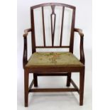 A GEORGIAN FRUITWOOD CARVER ARMCHAIR with a tapestry upholstered inset seat, 59cm wide at the arms